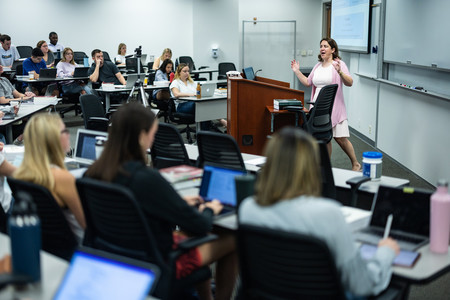 Tulane professor teaching in classroom